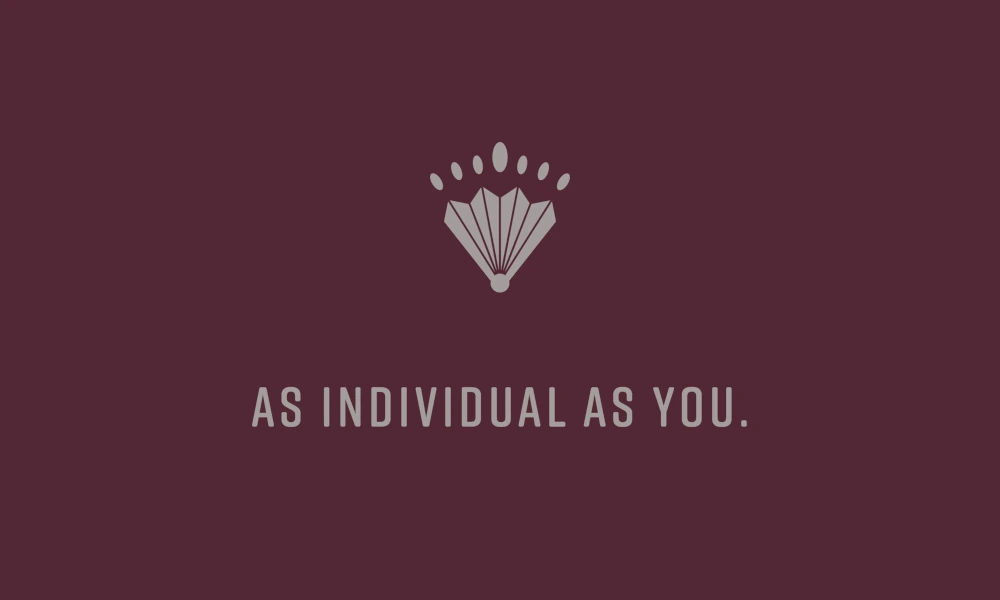 Logo des Erika Boutiquehotels mit dem Slogan 'As individual as you.' auf burgunderrotem Hintergrund.